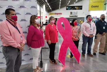 En aeropuerto de San Pedro Sula: Iluminan flama rosa solidaria en apoyo a la prevención del cáncer de mama