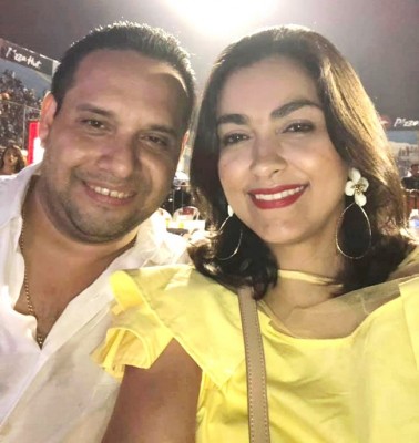 Joaquin Verdial y Victoria Paz disfutando del concierto de Nicky Jam