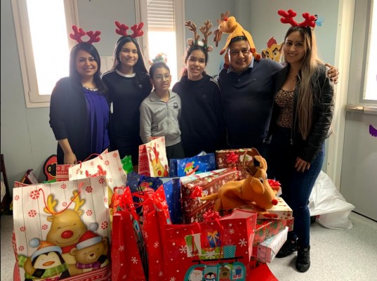 Colaboradores de Publicom llevan la alegría de la Navidad a pequeños pacientes del Hospital María